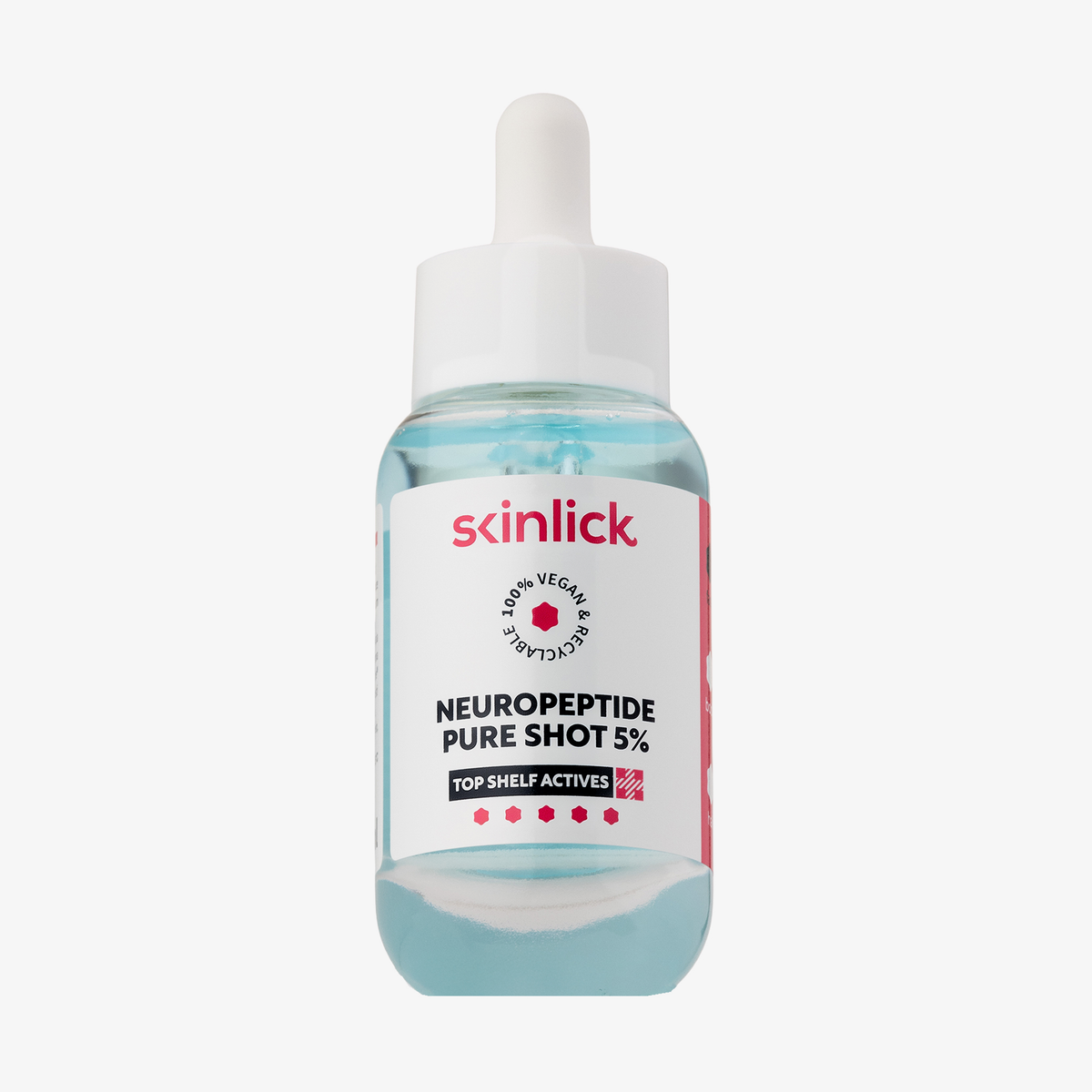 Flasche mit Pipette von skinlick Neuropeptide Pure Shot 5%, blaues Serum mit weißem Etikett und pink-schwarzer Schrift.