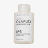 Mattierte transparente Flasche N°3 Hair Perfector 100 ml von OLAPLEX mit weißem Etikett und schwarzem Text vor weißem Hintergrund.