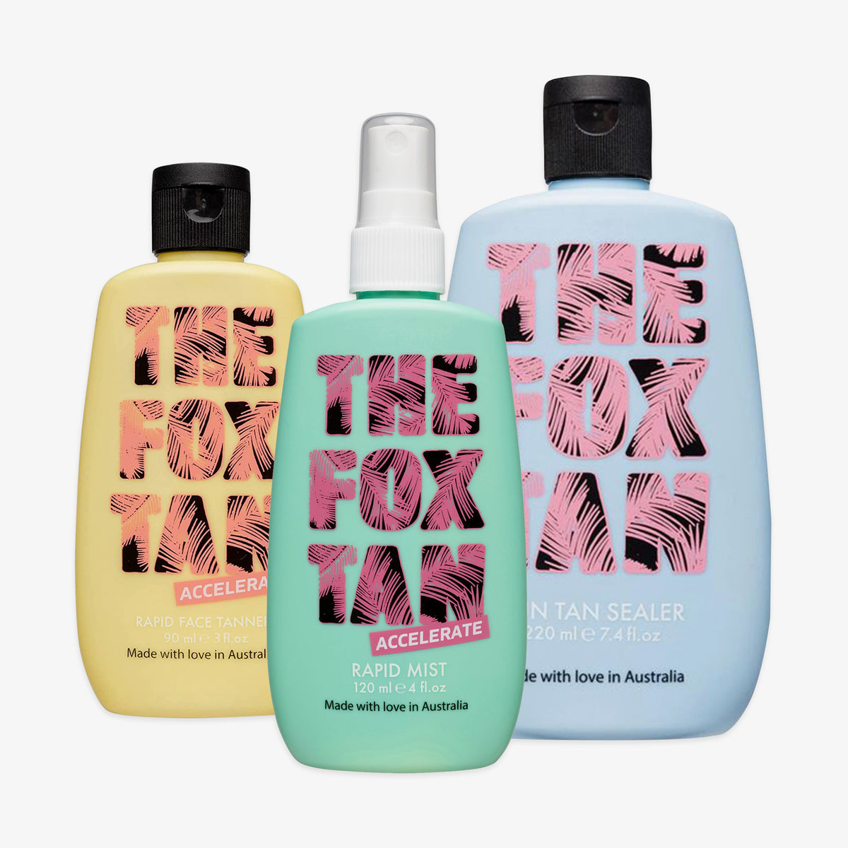 Das Tan Lines For Days-Bundle enthält drei Fox Tan-Flaschen: Gelb (Face Tanner), Mint (Rapid Mist) und Blau (Sun Tan Sealer), zusammen angeordnet.