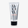 Eine silberne Tube Travel Color Security Shampoo 75 ml mit schwarzem Deckel steht vor einem weißen Hintergrund.