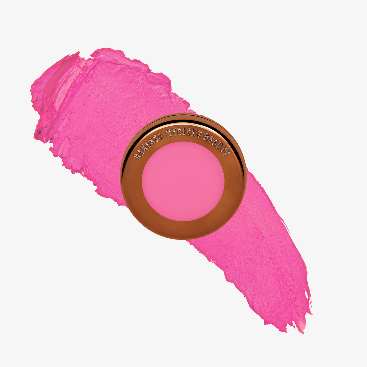Yummy Skin Blurring Balm Powder Flushed It Girl in rundem bronzenem Behälter auf pinkem Farbmuster abgebildet.