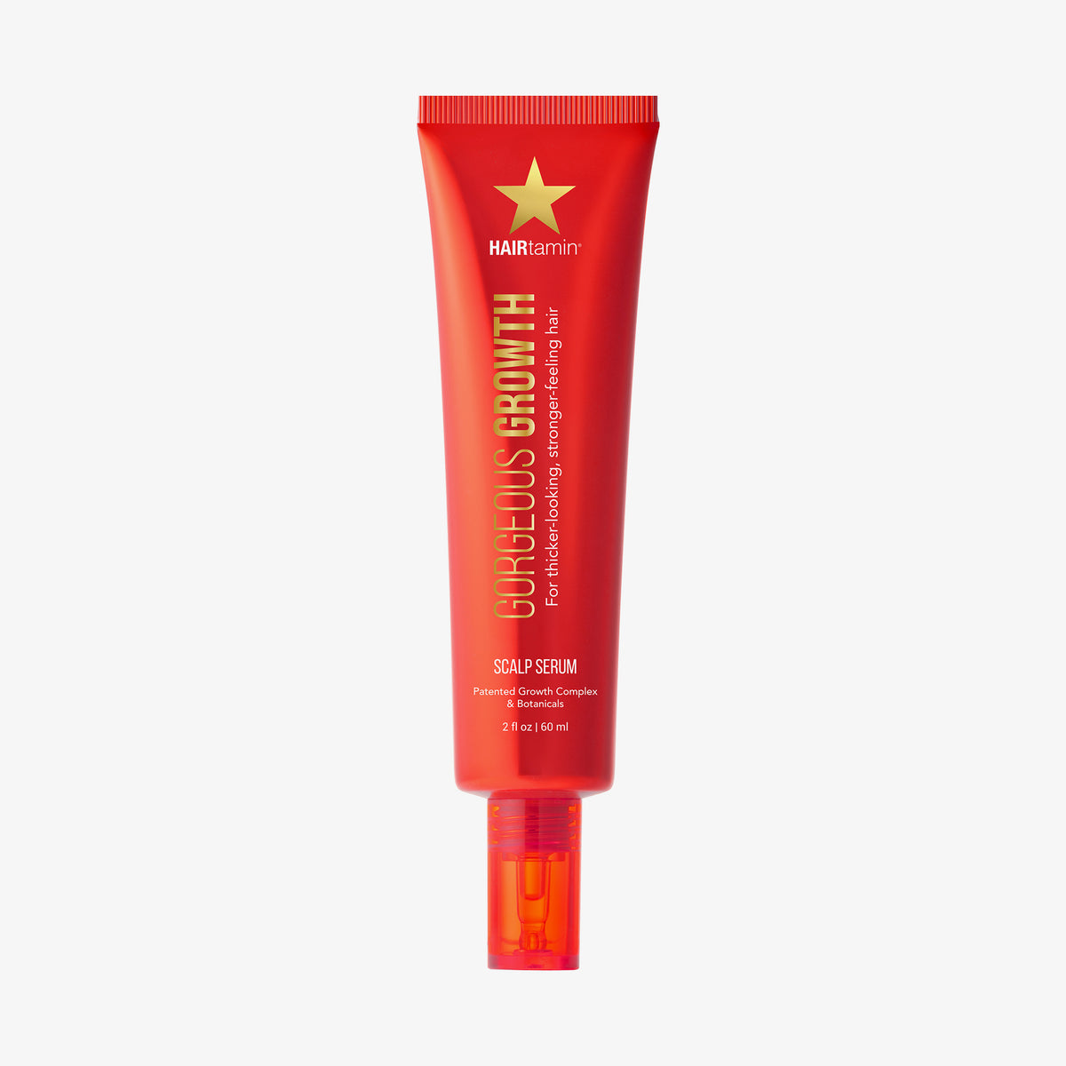 Rote Tube HAIRtamin Scalp Serum mit einem goldenen Stern auf der Verpackungvor weißem Hintergrund.
