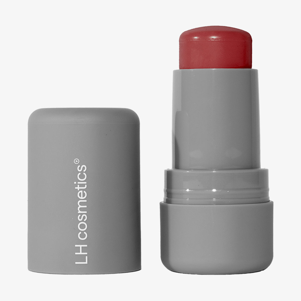 Ein geöffneter grauer Drehstift mit herausgedrehtem rosarotem Artistick Blush Canvas vor weißem Hintergrund