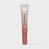 Eine Tube Plush Cuddle von LH Cosmetics mit weiß-rosé Farbverlauf auf weißem Hintergrund.