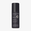 Schwarze Sprühflasche Living Proof Style Lab Blowout mit weißem Text auf weißem Hintergrund.