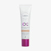 Weiße Tube Lumene CC Color Correcting Cream SPF20 in der Farbe Fair mit violetter Kappe.