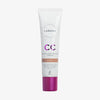 Weiße Tube Lumene CC Color Correcting Cream SPF20 in der Farbe Tan mit violetter Kappe.