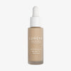 Mattierte transparente Flasche Lumene INVISIBLE ILLUMINATION Glow Beauty Serum in Universal Medium mit einem weißen Tropfverschluss.