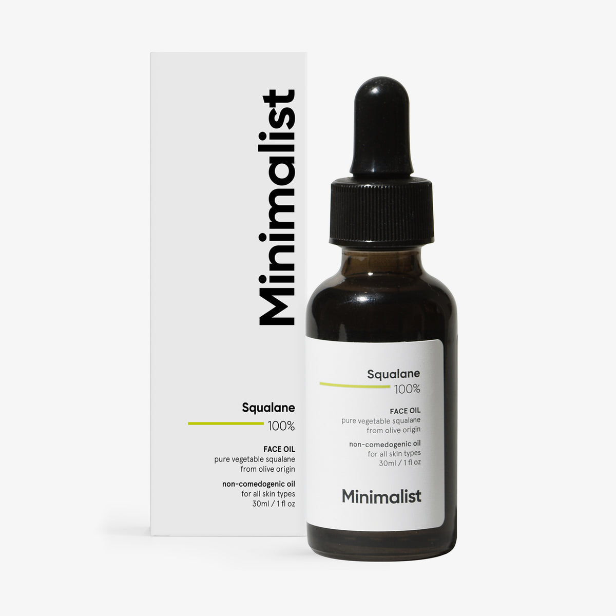 Minimalist Squalane 100 % Face Oil in dunkler Pipettenflasche neben weißer Produktbox. Pflanzliches, nicht-komedogenes Öl für alle Hauttypen.