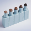 Fünf NABLA Cosmetics Contour Sticks in hellblauer Verpackung sind in einer Reihe angeordnet und zeigen die Nuancen von hell bis dunkel.
