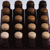 Der Art Of Skin Foundation Stick von NABLA Cosmetics präsentiert auf weißem Hintergrund eine Reihe von Braun- und Beigetönen.