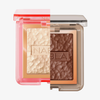 Teilbild von zwei quadratischen NABLA Cosmetics Illuminating Bundle Dosen: eine hellgoldene, eine tiefbronzefarbene, beide mit strukturierter Oberfläche.