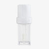 Lip Candy Oil in Salted Coconut von NABLA in transparenter Verpackung mit weißem Deckel und glänzender transparenter Textur.