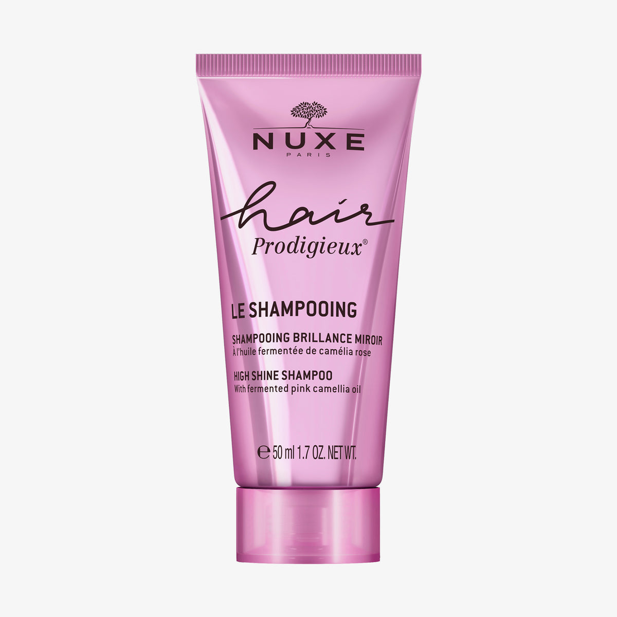 50 ml rosa Tube NUXE Hair Prodigieux Glanz-Shampoo mit Kamelienöl auf weißem Hintergrund.