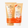 Das NUXE Sun Set beinhaltet Sonnenmilch LSF 30 und ein Duschshampoo, beides in orangefarbenen Tuben.