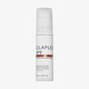 Weiße Pumpflasche des N°9 Bond Protector Nourishing Hair Serum mit transparentem Deckel auf weißem Hintergrund.