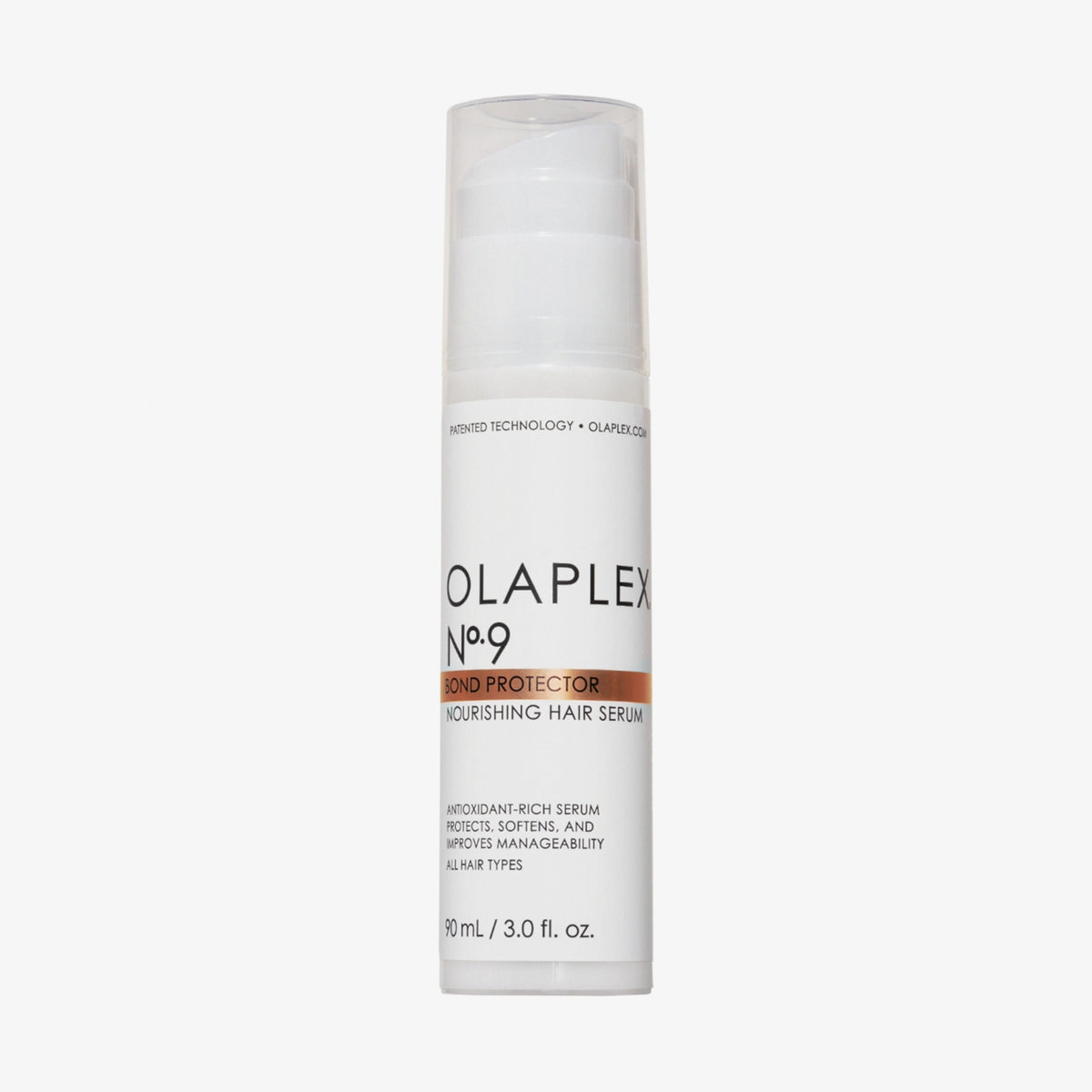 Weiße Pumpflasche des N°9 Bond Protector Nourishing Hair Serum mit transparentem Deckel auf weißem Hintergrund.