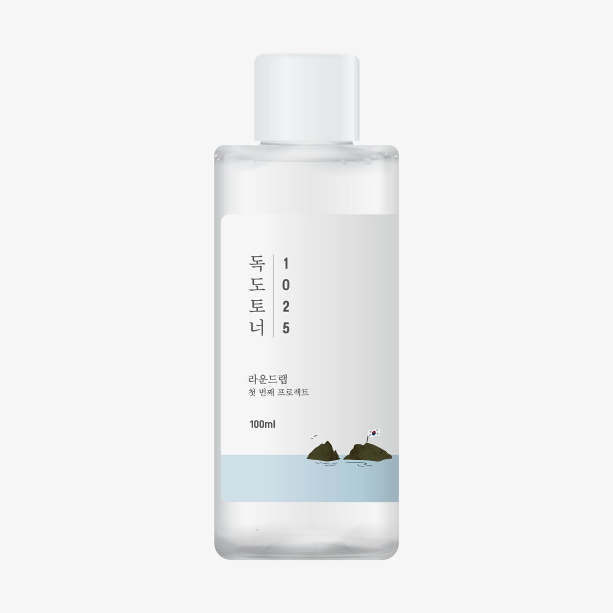 1025 Dokdo Toner in einer durchsichtigen 100-ml-Flasche mit weißem Deckel und koreanischem Text auf dem Etikett, enthält transparente Flüssigkeit.