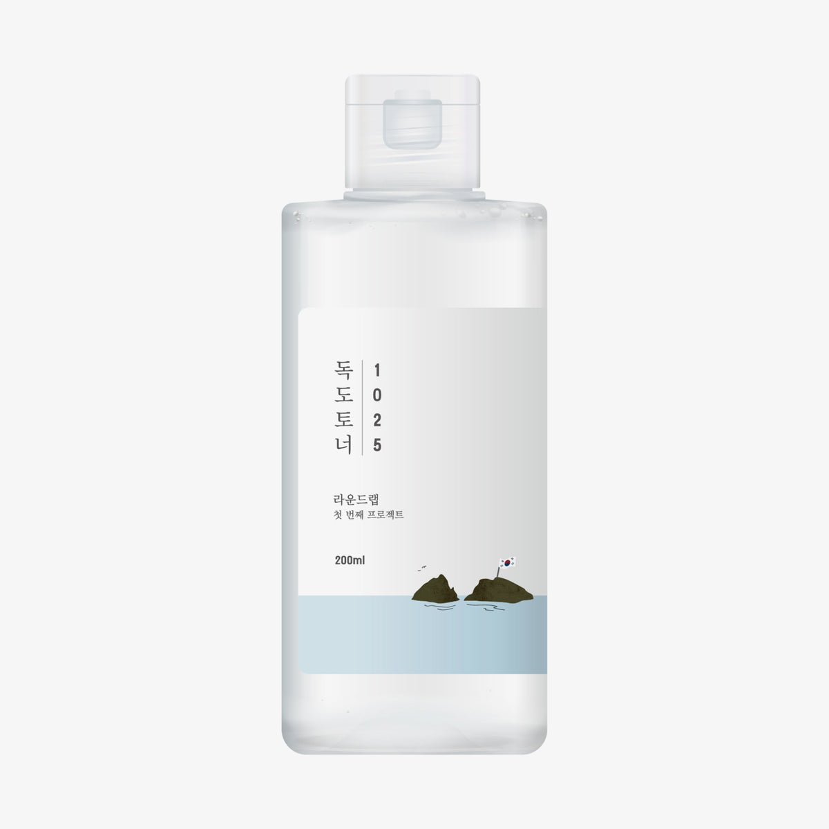 1205 Dokdo Toner in einer durchsichtigen 200-ml--Flasche mit weißem Deckel und koreanischen Text auf dem Etikett, enthält transparente Flüssigkeit.