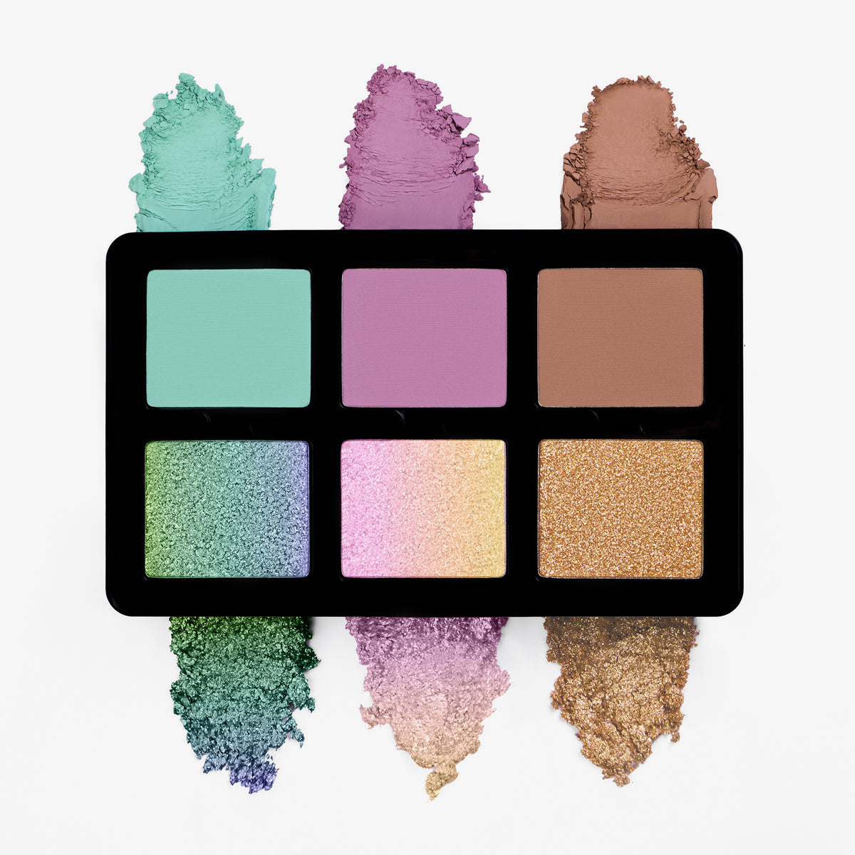 Die Lightwork Freedom Mini Palette Pastel Dream mit pastellgrünem, fliederfarbenem, braunem, grün-blau schimmerndem, rosa-gelb schimmerndem und gold schimmerndem Farbmuster.