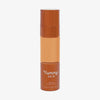 Eine halbtransparente und bronzene Flasche Yummy Skin Serum Foundation 12W mit warm beigem Inhalt.