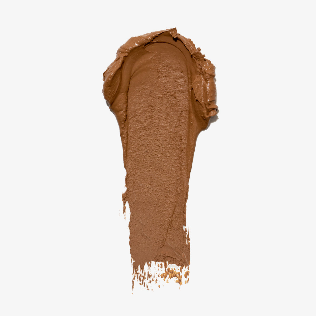 Ein Tupfer Cronzer - Cream Bronzer auf einer weißen Oberfläche.