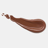 Ein glatter, cremiger Farbstreifen Melted Sun Liquid Bronzer 035 in tiefem Braun auf heller Oberfläche.