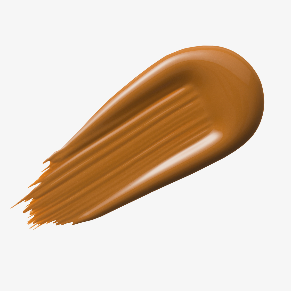 Warmes braunes Farbmuster des Yummy Skin Serum Tint 12 auf weißem Hintergrund.