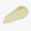 Ein beiger Farbstreifen Yummy Skin Blurring Balm Powder Shade Universal auf weißem Hintergrund.