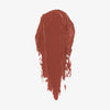 Ein rostroter Farbstreifen des Blush Stick - 2-in-1 Creme Rouge mit Pinsel in der Farbe Scarlet.