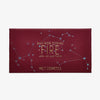Eine rote Bad Side Zodiac FIRE Lidschattenpalette von Melt Cosmetics mit Sternbild-Design