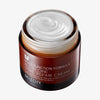 Braunes Glas mit geöffneter Mizon Snail Repair Cream, sichtbare weiße Creme mit geschwungener Textur auf weißem Hintergrund.