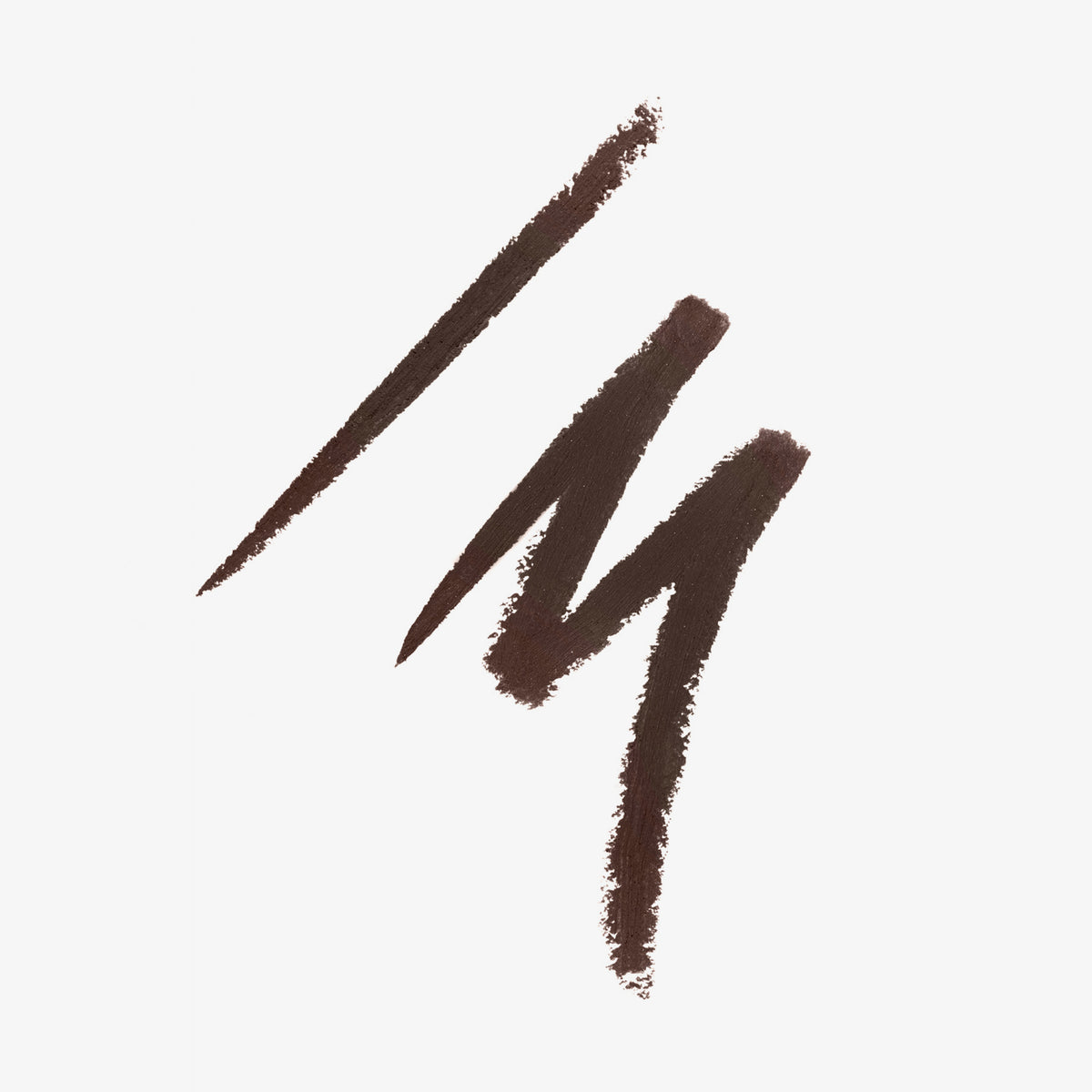 Drei dunkelbraune, unterschiedlich dicke Linien auf weißem Hintergrund, gemalt mit einem cremigen Kajalstift – zeigen die Farbintensität und Textur.