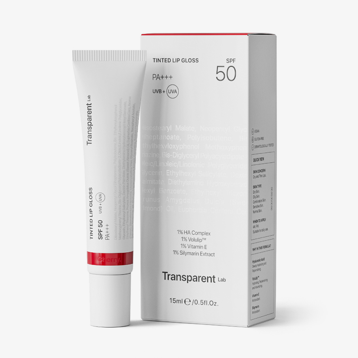Weiße Lipgloss-Tube mit Lichtschutzfaktor 50 steht neben der Schachtel mit Liste der Hautpflegebestandteile.