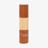 Eine halbtransparente und bronzene Flasche Yummy Skin Serum Foundation 6N mit warm-beigem Inhalt.