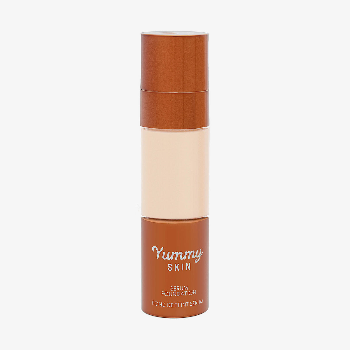 Eine halbtransparente und bronzene Flasche Yummy Skin Serum Foundation 1P mit hellbeigem Inhalt.