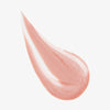 Ein rosa schimmerndes Farbmuster des Lumene INVISIBLE ILLUMINATION Illuminizer in der Farbe Rosy Dawn.