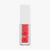 Transparente Flasche mit rotem Glossin‘ Glow Tinted Lip Oil 020 von Catrice und weißem Deckel vor weißem Hintergrund.