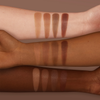 Drei Arme mit unterschiedlichen Hauttönen zeigen jeweils vier Skin Bronzing-Swatches in verschiedenen Tönen.