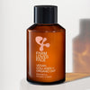 Braune Flasche Vegan Collagen + Organic Oat Barrier & Hydro Toner vor hellem Hintergrund.