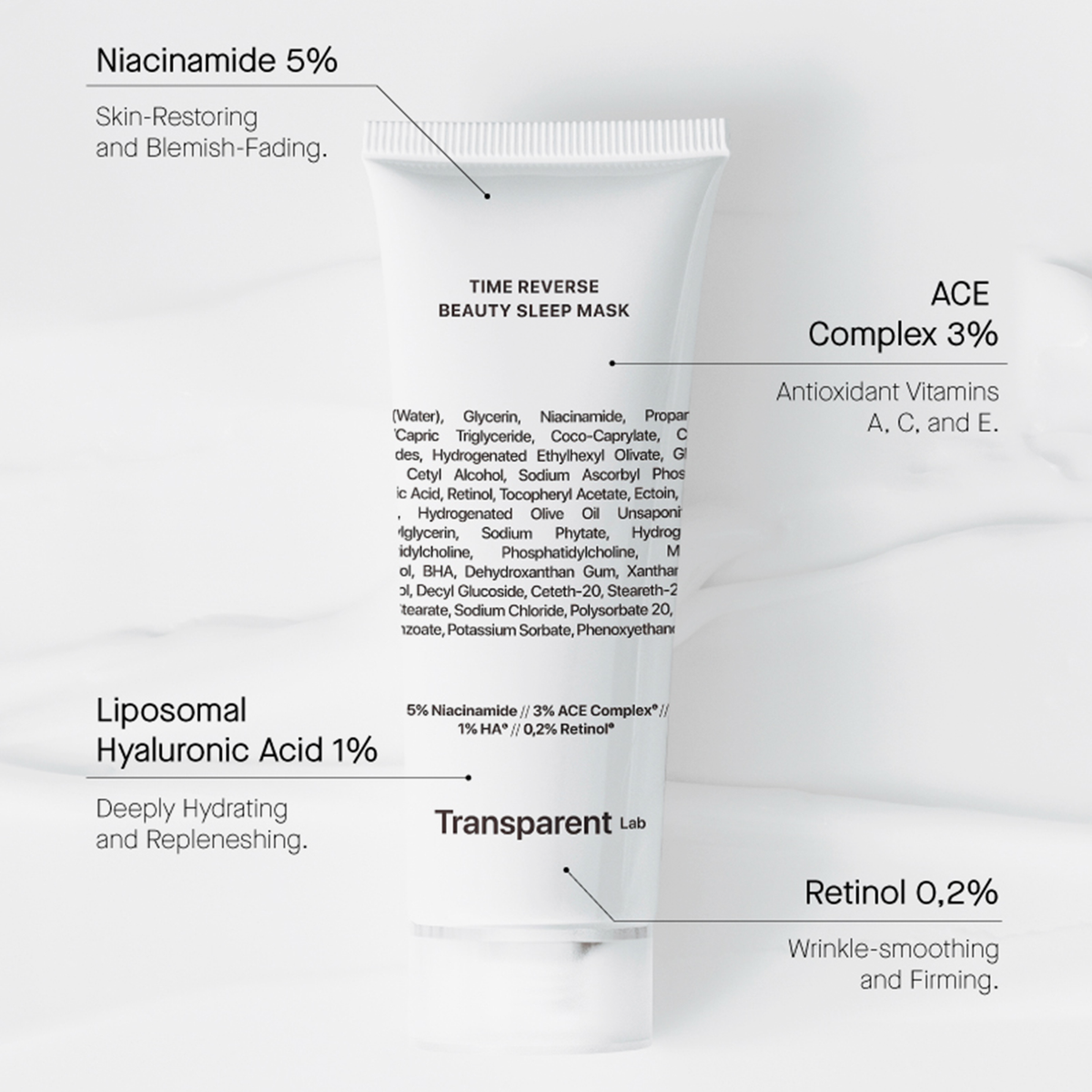 Die Tube der Time Reverse Beauty Sleep Mask liegt auf einer Marmoroberfläche und präsentiert die Highlights und Vorteile ihrer Hautpflegebestandteile.