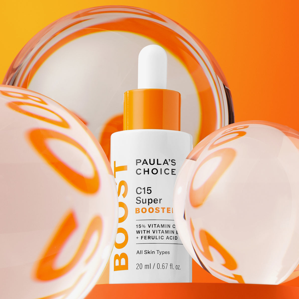 Flasche des Paula’s Choice C15 Super Boosters mit Pipette vor orangem Hintergrund, umgeben von transparenten Kugeln mit „BOOST“-Schriftzug.