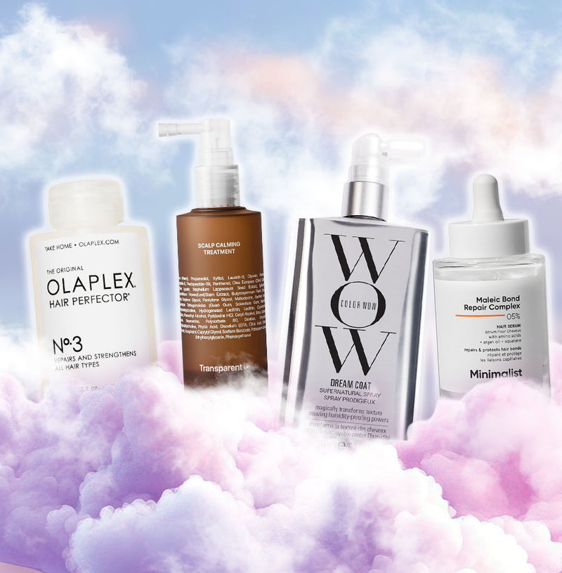 Vier Haarpflegeprodukte – Olaplex No.3, Transparent Lab Scalp Calming Treatment, Color Wow Dream Coat und Minimalist Hair Serum – schweben vor lila Wolken.