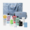Hellblaue Purish-Tasche aus Cord mit 8 passenden Beauty-Produkten, darunter Sonnenpflege & Tanning-Produkte sowie ein Kulturbeutel und ein Kartenspiel.