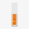 Transparente Flasche mit orangem Glossin‘ Glow Tinted Lip Oil 030 von Catrice und weißem Deckel vor weißem Hintergrund.