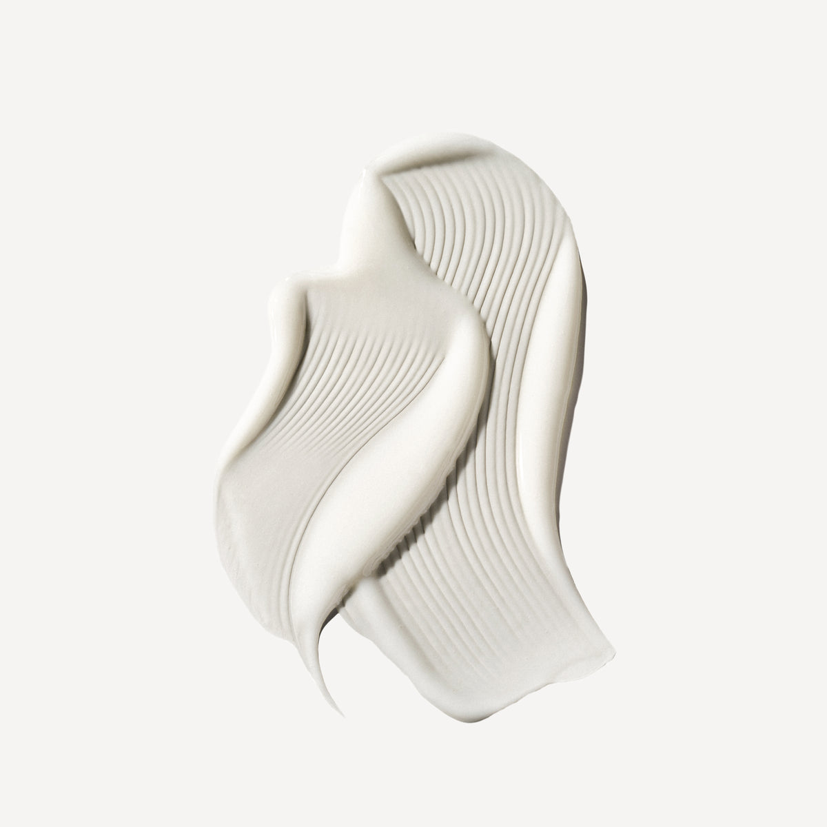 Cremeweißer No°5 Moisturize & Mend Leave-in Conditioner von OLAPLEX in strukturierten, gewellten Linien auf einem schlichten, hellen Hintergrund.