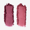 Zwei pudrige Farbmuster der Duo Dimension Element von LH Cosmetics, nebeneinander auf weißem Hintergrund.