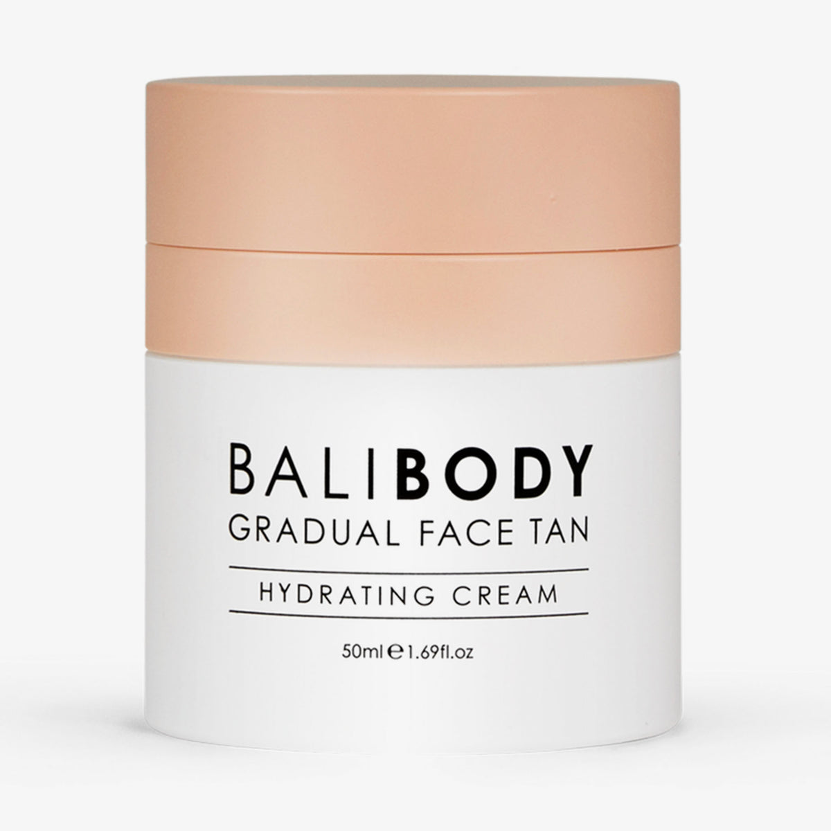 Weißer Tiegel Gradual Face Tan mit pfirsichfarbenen Deckel vor weißem Hintergrund