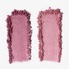 Zwei pudrige Farbmuster der Duo Dimension Area von LH Cosmetics, nebeneinander auf weißem Hintergrund.