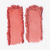 Zwei pudrige Farbmuster der Duo Dimension Zone von LH Cosmetics, nebeneinander auf weißem Hintergrund.